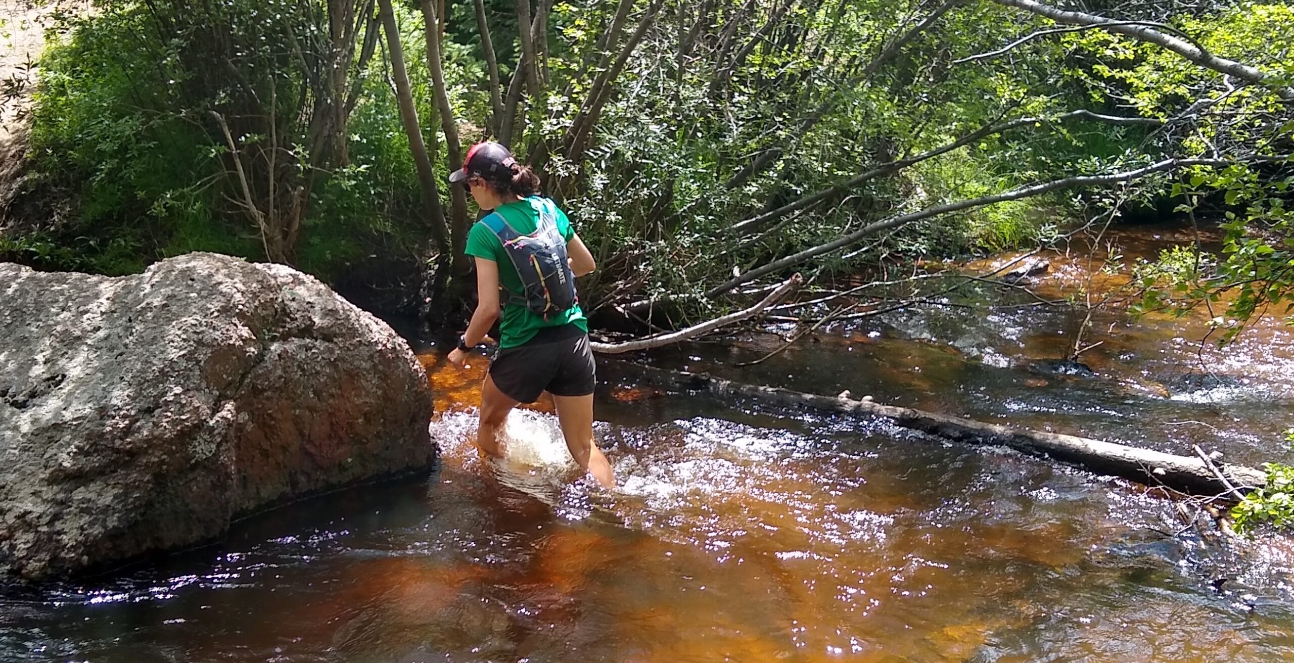 Julia crossing a creek